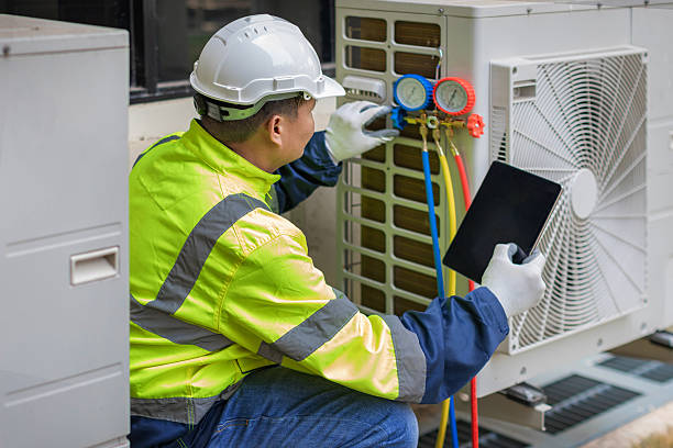 Professional Heat Pump Repair technician working in Brinson, GA